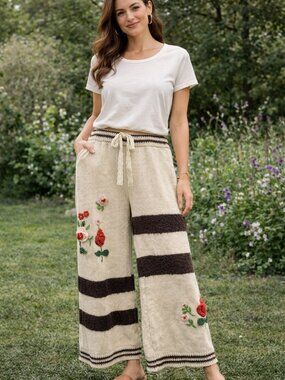 POL knit pants with floral embellishments; size small